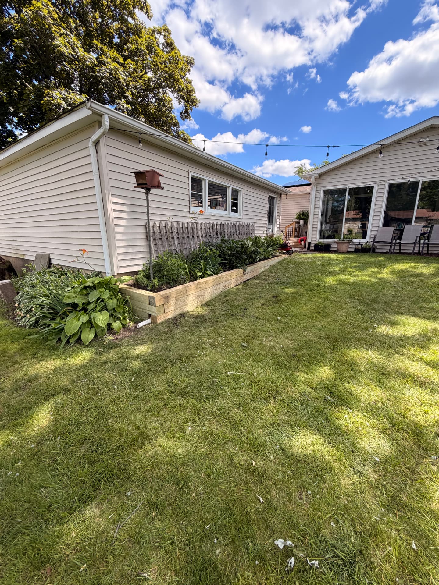Wide yard view after the restore