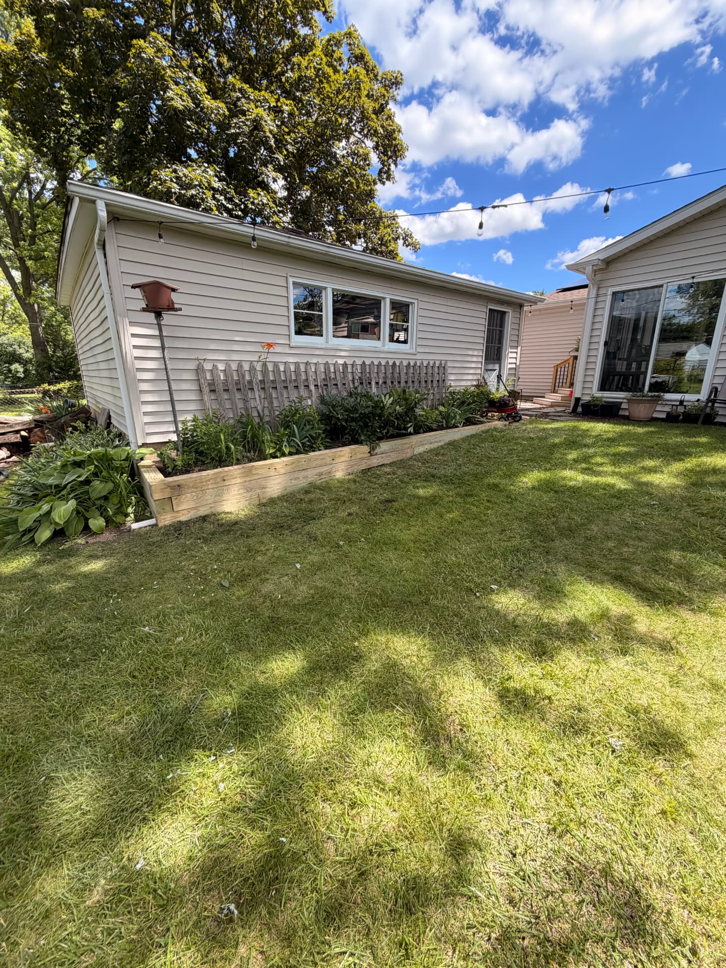 Bed line tying into the patio side of the yard